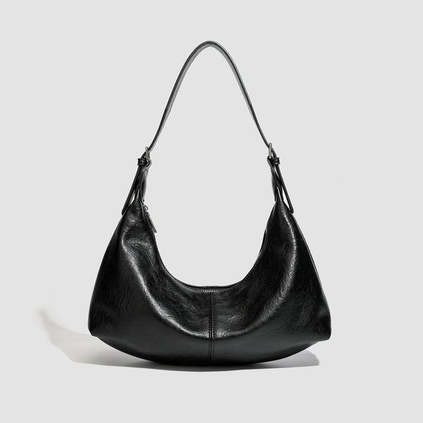 Slouchy crescent hobo shoulder bag with zip-top closure and adjustable strap, detail view 6