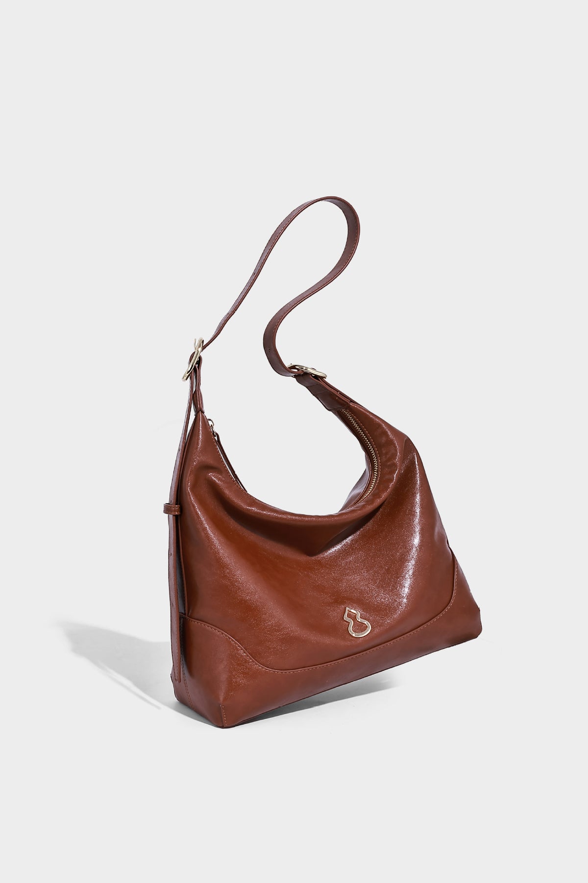 Glossy leather-look slouchy hobo shoulder bag with zip closure, gold-tone hardware, and adjustable strap, detail view 15