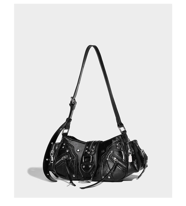 Compact glossy leather-look crossbody bag with silver studs, buckle hardware, and multiple zip pockets, detail view 10