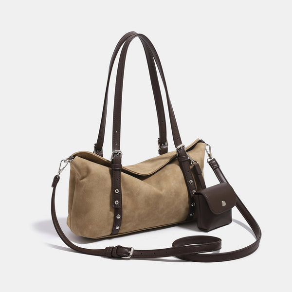 Soft slouchy suede-look shoulder tote with dark brown leather-look trim, silver-tone stud hardware, and attached snap-front