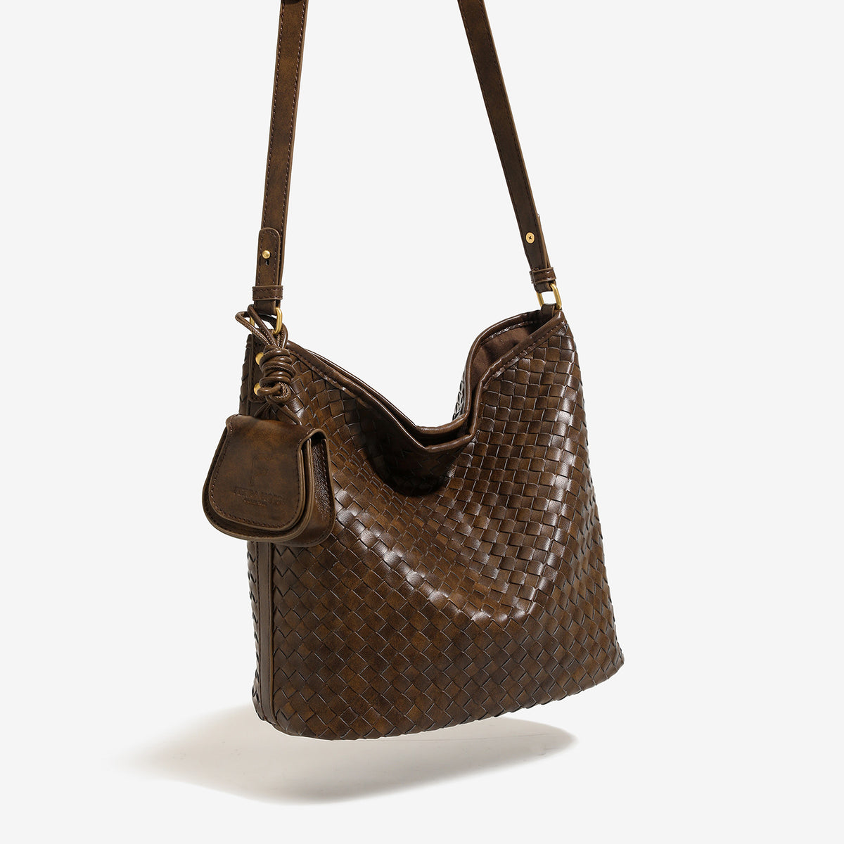 Dark brown woven leather-look bucket shoulder bag with mini pouch charm and gold-tone hardware, detail view 3