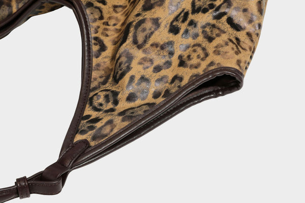 Large slouchy leopard-print shoulder tote bag with glossy tan-and-brown finish, dark brown leather-look trim, single