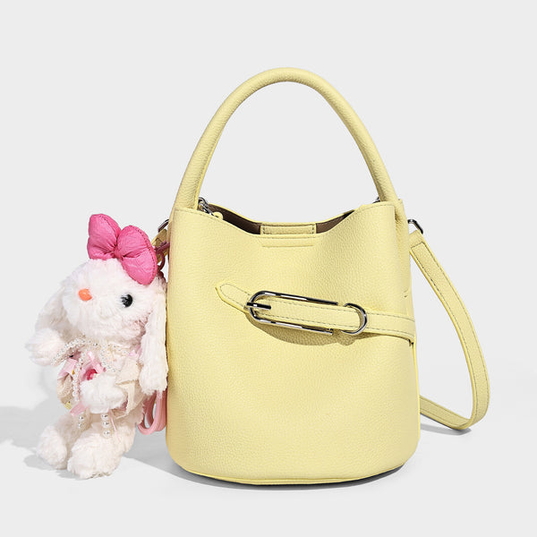 Mini pebbled leather-look bucket bag with front buckle strap, silver-tone hardware, top handle, and detachable shoulder