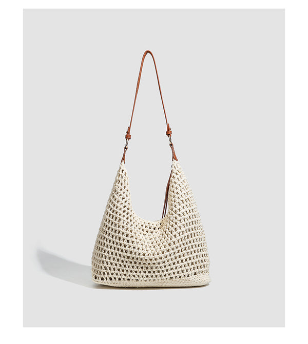 Cream open-weave crochet hobo shoulder bag with tan leather-look strap and gold-tone ring hardware, detail view 8