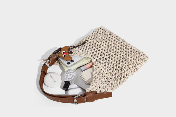 Slouchy open-knit crochet hobo tote bag with leather-look top handle and metal buckle hardware, detail view 24