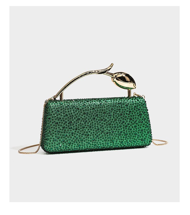rectangular hard-case rhinestone evening clutch with sculptural gold-tone branch-and-bud top handle and detachable chain