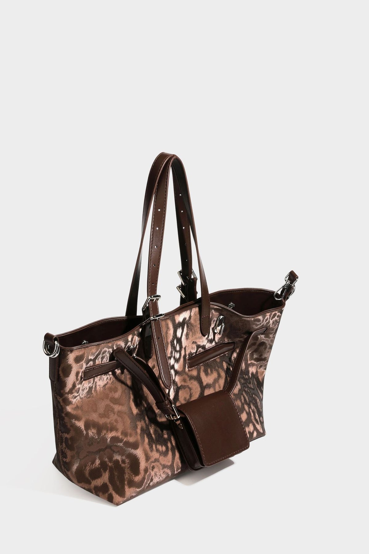 Glossy leopard-print tote bag with leather-look dark trim, dual top handles, detachable shoulder strap, and attached front