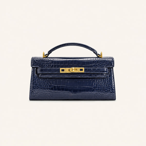 Strukturierte rechteckige Satchel-Tasche mit Krokodilprägung, goldfarbenem Drehverschluss und kurzem Henkel, Detailansicht 11