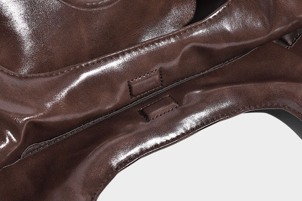 Glossy oil-wax leather-look open-top tote shoulder bag with embossed circular logo and long double straps, detail view 31