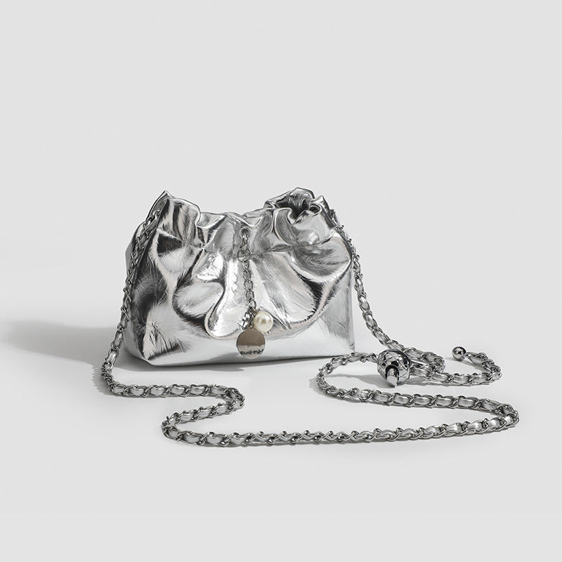 Small ruched drawstring bucket bag with twisted-link chain strap and pearl charm pull, detail view 2