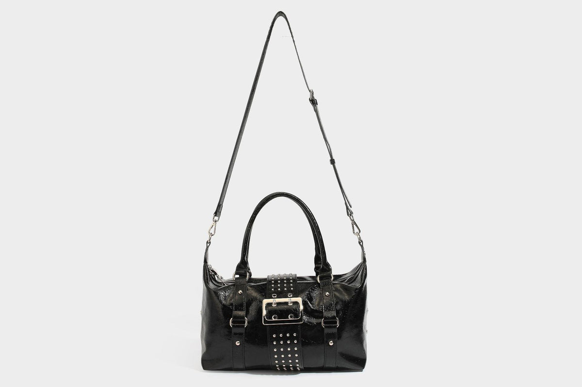Glossy crinkled barrel handbag with silver stud buckle strap and detachable shoulder strap, detail view 37