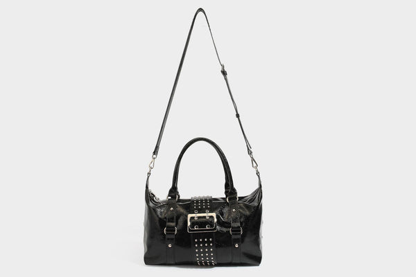 Glossy crinkled barrel handbag with silver stud buckle strap and detachable shoulder strap, detail view 37