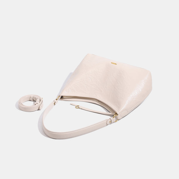 Large crinkled leather-look hobo shoulder bag with zip closure and gold-tone hardware, detail view 4