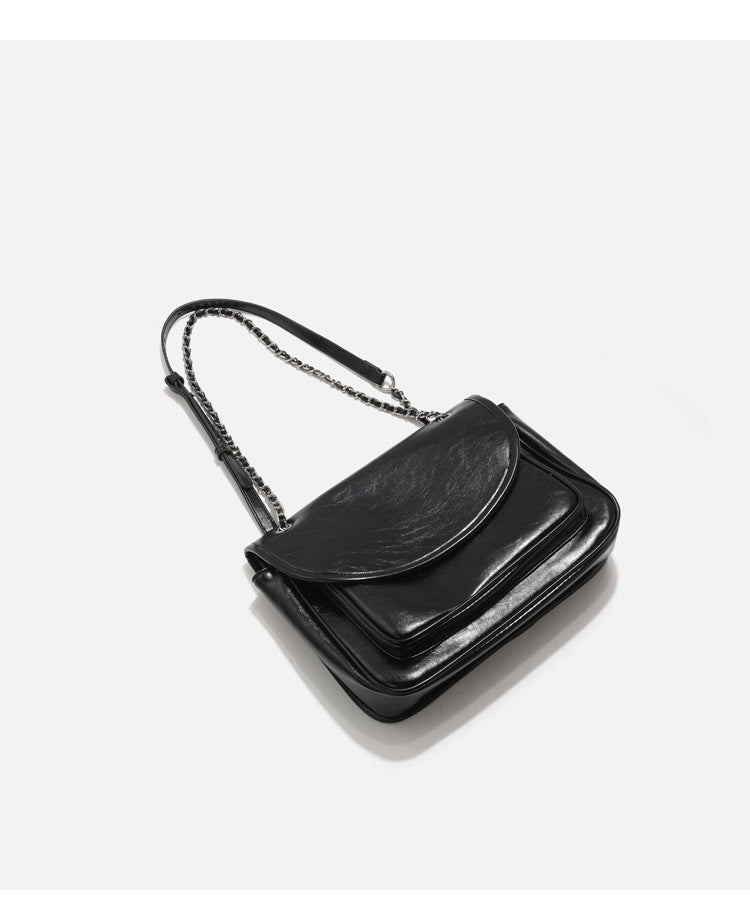 Structured glossy leather-look flap shoulder bag with silver-tone chain strap, detail view 11
