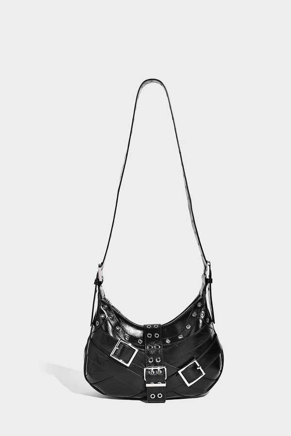 Glossy crescent hobo bag with silver-tone grommets, square buckle straps, and top zipper closure, detail view 25