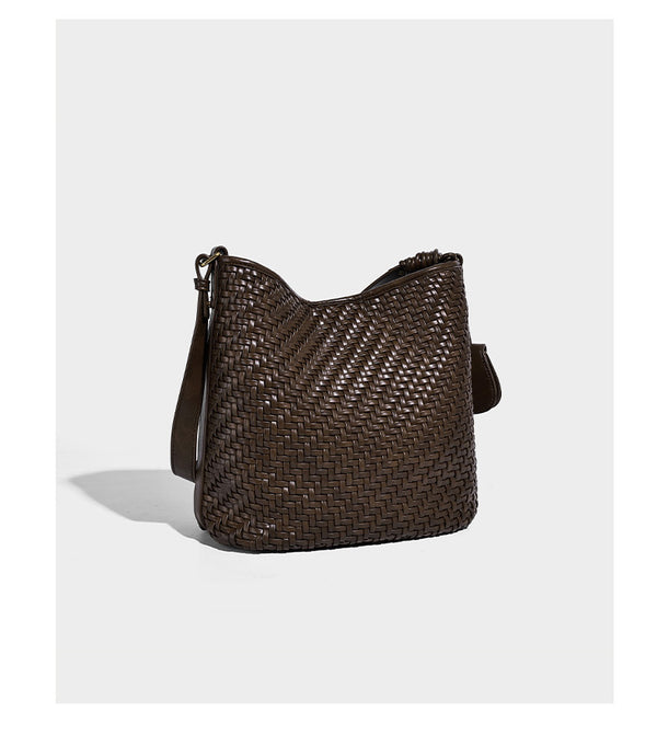 Woven leather-look bucket bag with basket-weave texture, attached mini pouch, and adjustable shoulder strap, detail view 14