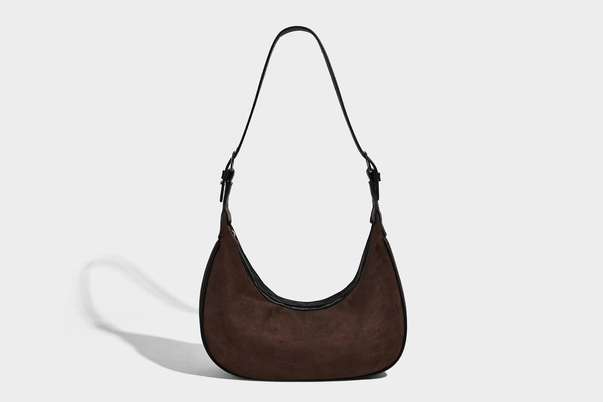 Crescent hobo shoulder bag in matte suede-look finish with black trim and adjustable strap, detail view 20