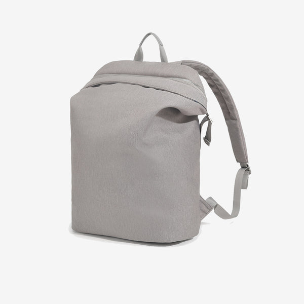 Structured matte-fabric backpack handbag with silver-tone zip closure and top carry handle, detail view 10