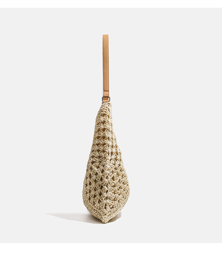 Natural ivory open-weave crochet hobo shoulder bag with tan leather-look strap and cream fabric lining, detail view 7