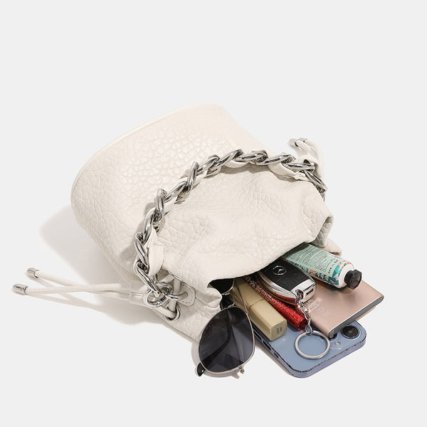Mini pebbled leather-look bucket bag with chunky silver-tone chain handle and drawstring closure, detail view 4