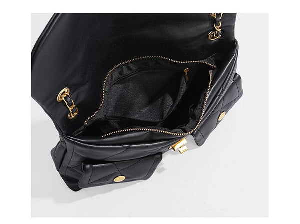 Quilted diamond flap shoulder bag with gold-tone chain strap and twist-lock closure, detail view 9