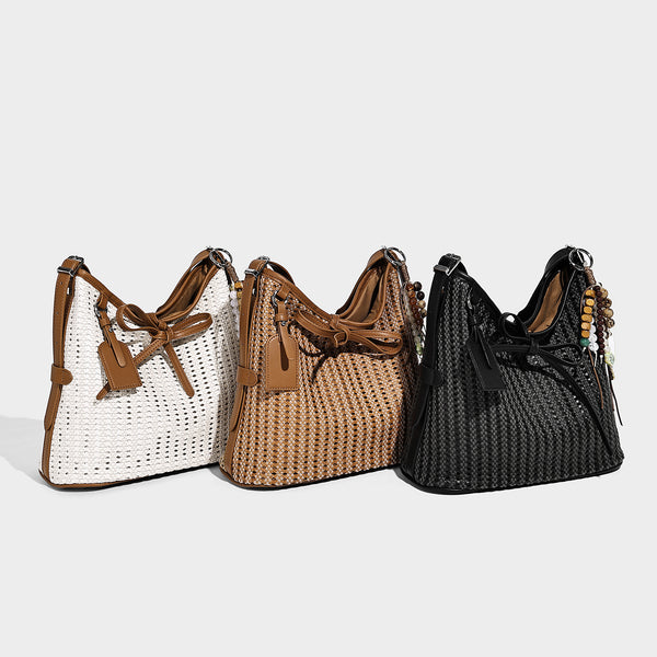Slouchy open-weave shoulder tote bag with leather-look tan trim, tie-front closure, and long adjustable strap, detail view 2