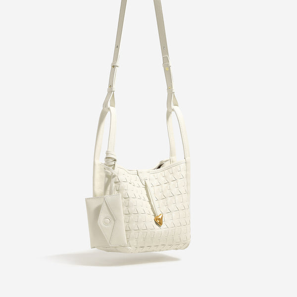 Woven embossed leather-look bucket bag with triangular texture pattern, gold-tone hardware, and attached mini snap pouch