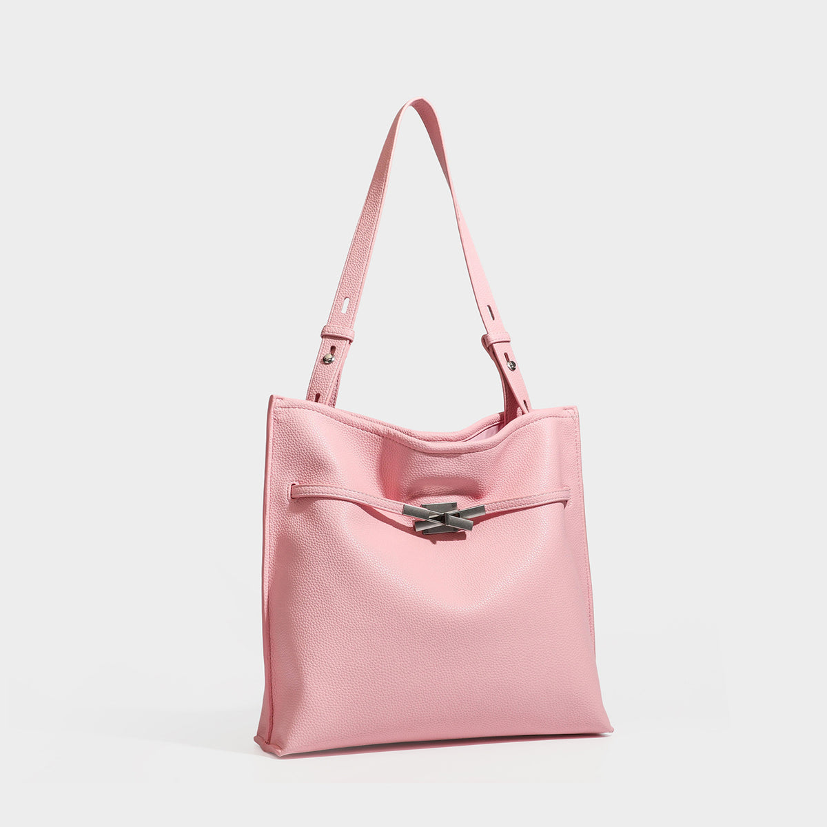 Pebbled leather-look tote bag with front toggle hardware and long shoulder strap, detail view 4