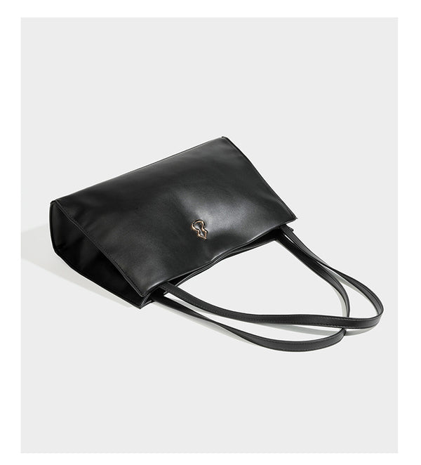 Structured rectangular shoulder tote bag with smooth leather-look finish, long double straps, and gold-tone gourd emblem on