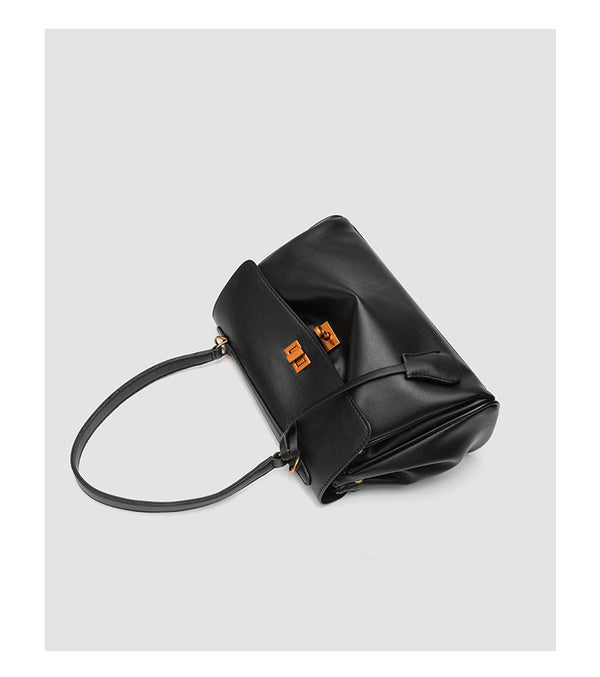 Structured black leather-look flap satchel bag with silver turn-lock hardware and top handle, detail view 22