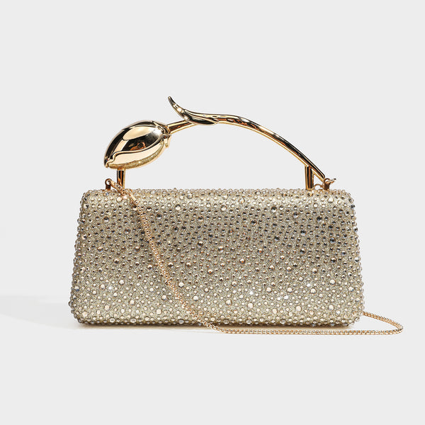 rectangular hard-case rhinestone evening clutch with sculptural gold-tone branch-and-bud top handle and detachable chain
