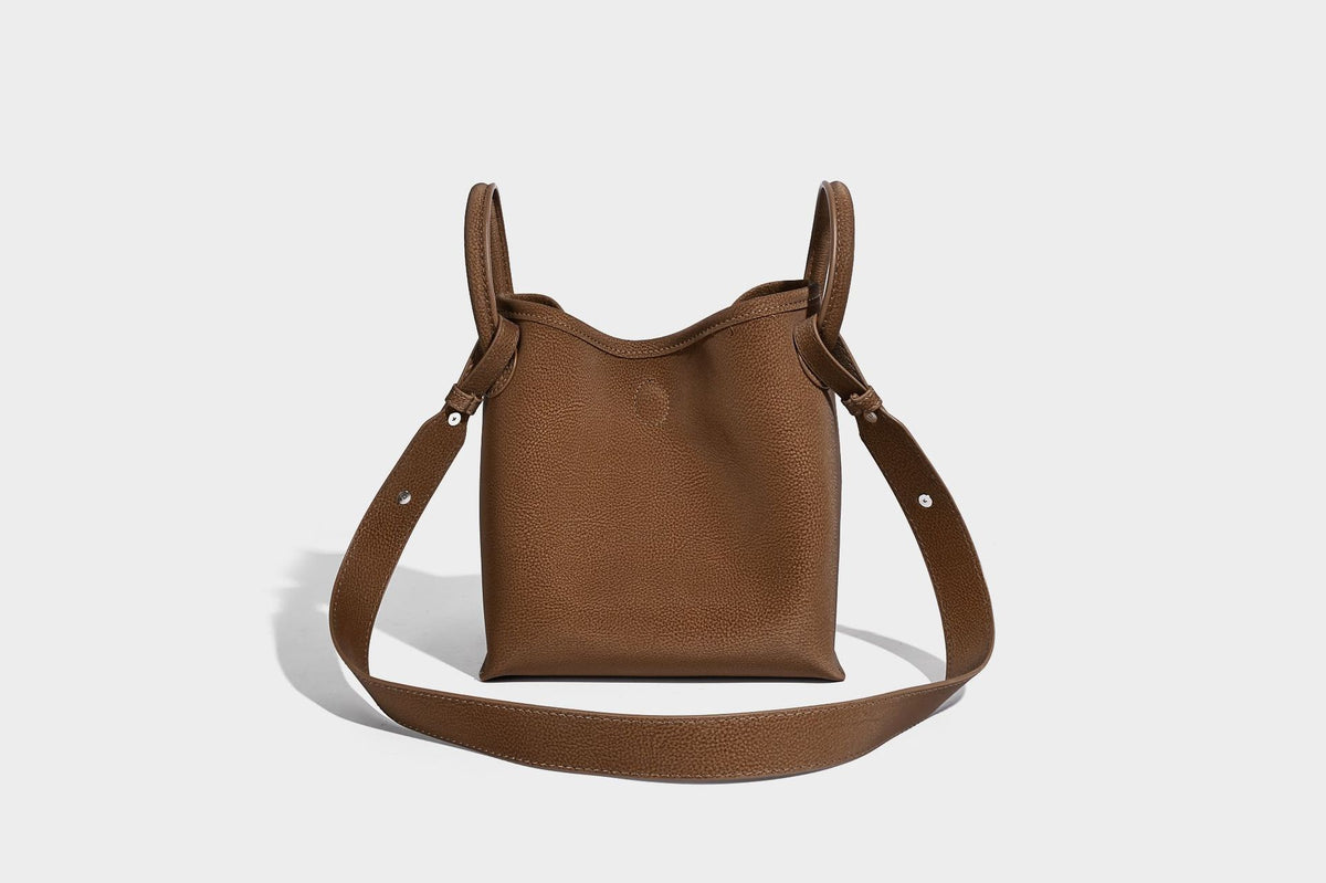 Small structured matte pebbled tote bag with twin top handles and removable zip pouch, detail view 30