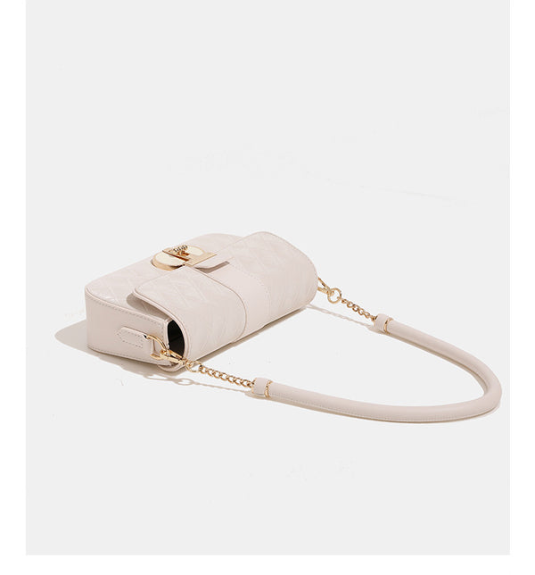 Compact rectangular quilted flap crossbody bag with gold-tone turn-lock closure and chain strap, detail view 15