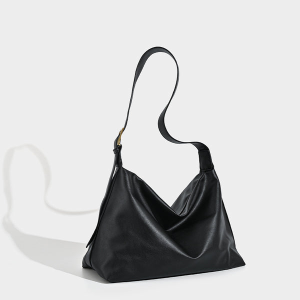 Large slouchy hobo shoulder bag in smooth black leather-look finish with gold-tone buckle hardware and adjustable strap