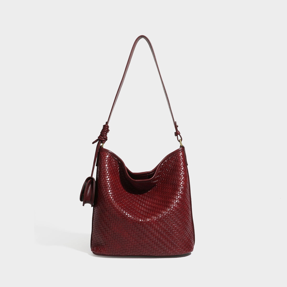 Woven-look slouchy hobo shoulder bag in brown with attached mini pouch and gold-tone hardware, detail view 8