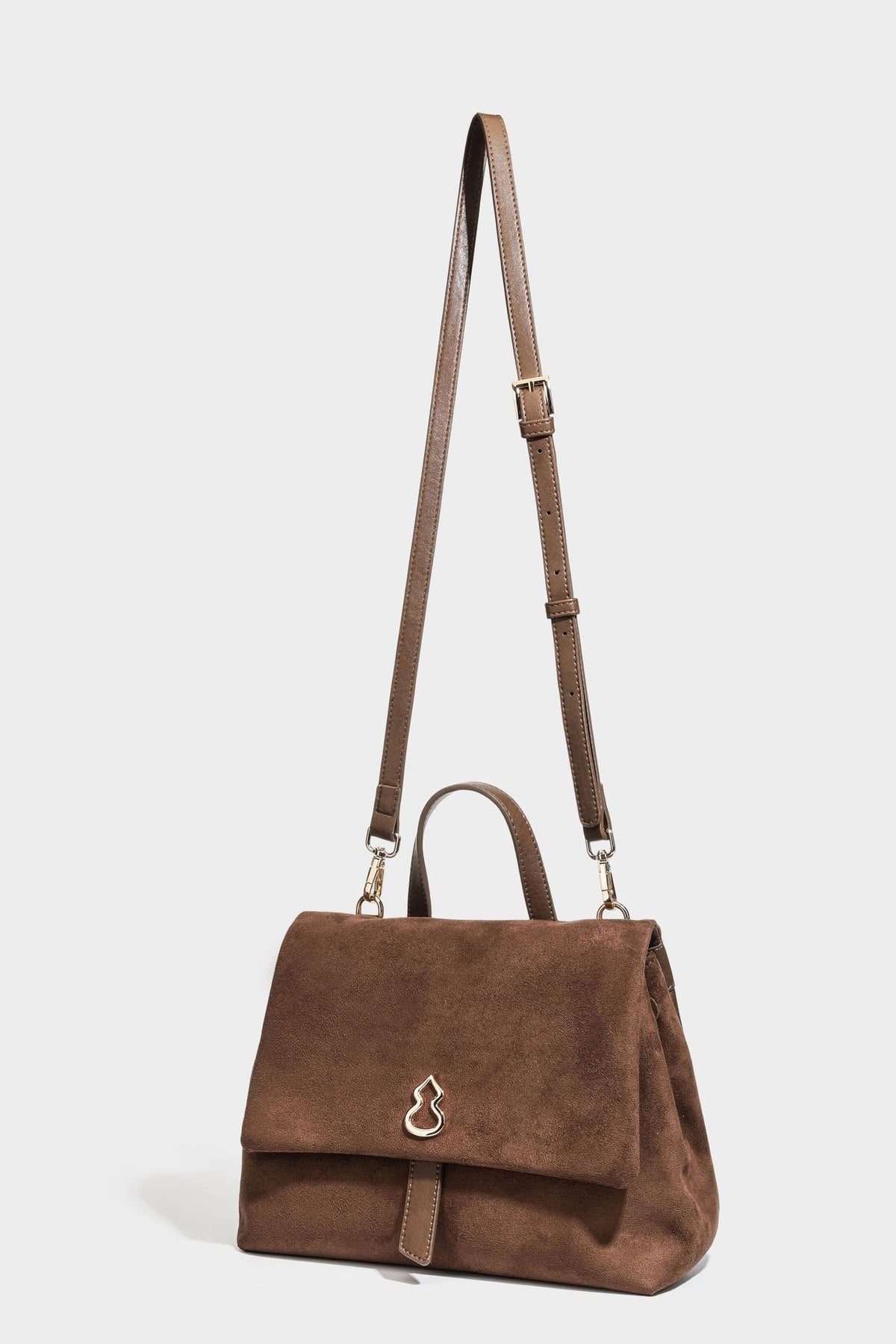 Formstabile Satchel-Tasche mit mattem Veloursleder-Finish, Überschlag, goldfarbenen Emblem-Beschlägen, kurzem Tragegriff und verstellbarem Crossbody-Riemen