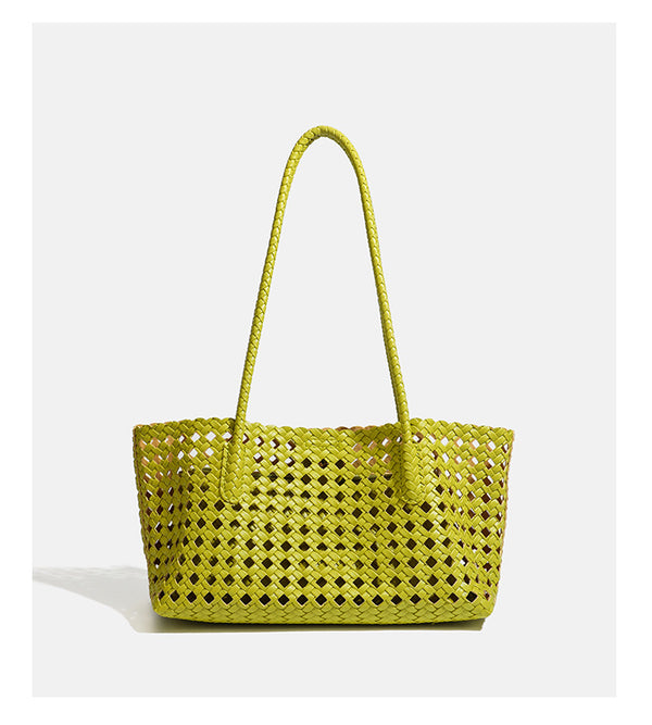 Limettengrüne Tote-Bag aus durchbrochenem Flechtmaterial mit langen, geflochtenen Schulterriemen und gewelltem oberen Rand, Detailansicht 17