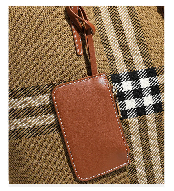 Large structured plaid check tote bag with smooth tan leather-look shoulder straps, attached front zip pouch, and gold-tone