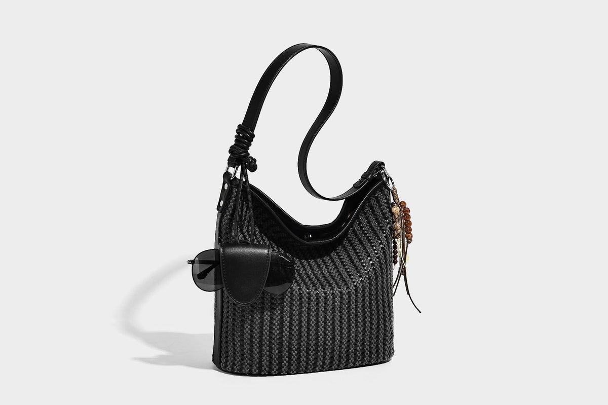 Slouchy open-weave hobo shoulder bag with leather-look trim, beaded tassel charm, and adjustable strap, detail view 14