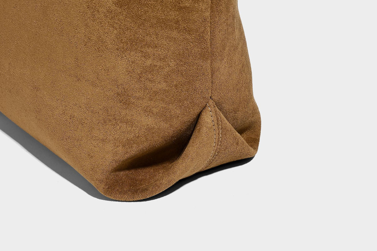 Structured suede-look shopper tote with wraparound belt strap and gold turn-lock clasp, long dark brown shoulder handles
