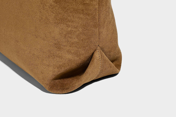 Structured suede-look shopper tote with wraparound belt strap and gold turn-lock clasp, long dark brown shoulder handles