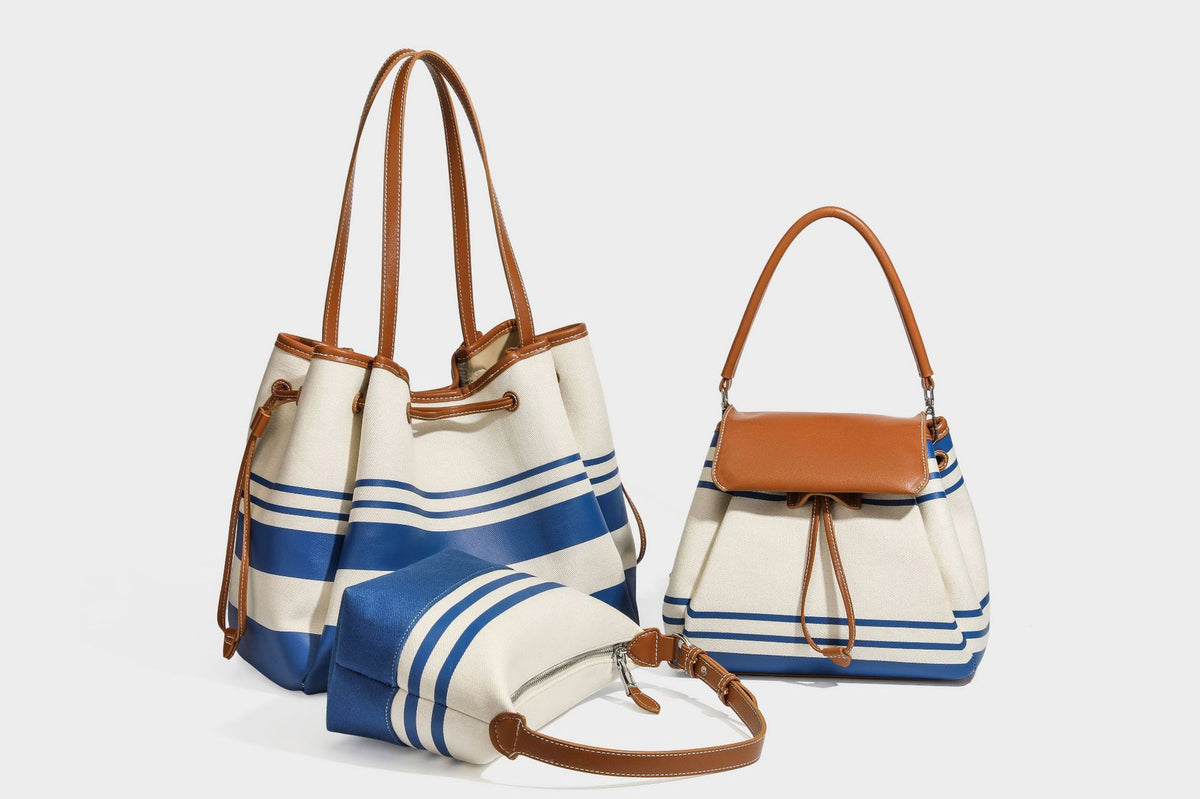 Cremefarbene und blau gestreifte Canvas-Schultertasche mit Träger in Lederoptik und Reißverschluss in Silberoptik, Detailansicht 28
