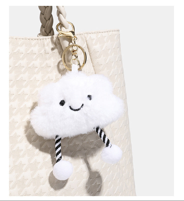 Structured geometric-embossed tote bag with braided shoulder straps and gold-tone hardware in ivory, detail view 14