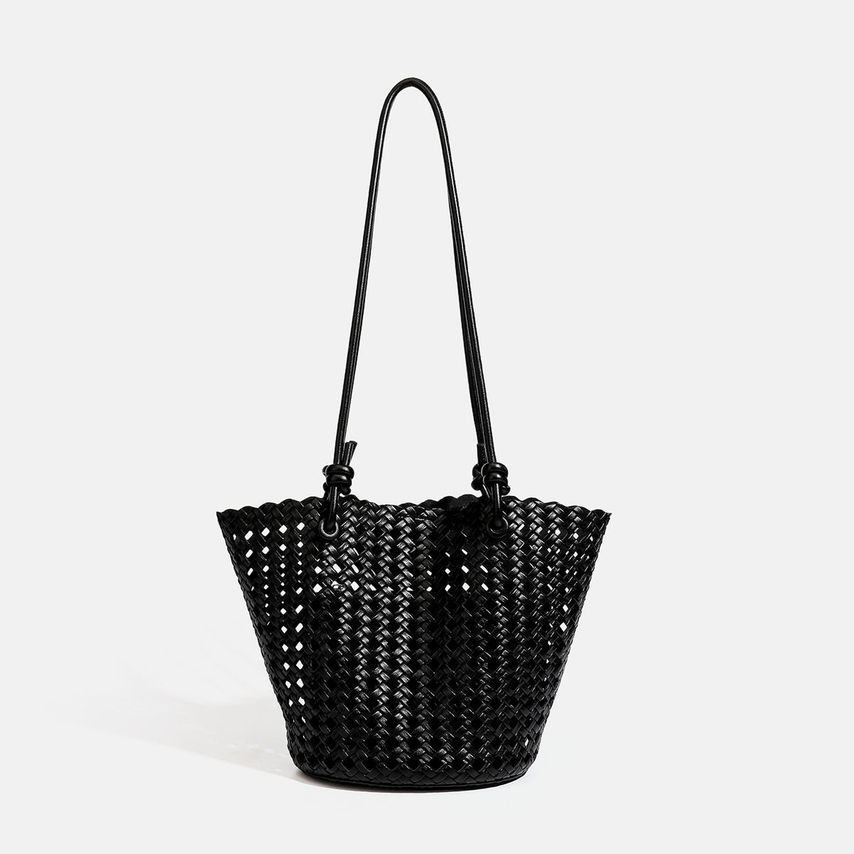 Open-weave lattice bucket tote bag with long knotted cord handles and tapered silhouette, detail view 9