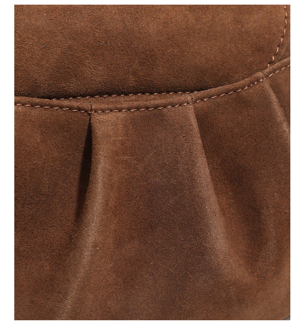 Small rounded flap crossbody saddle bag with gold-tone ring hardware and adjustable strap, detail view 14