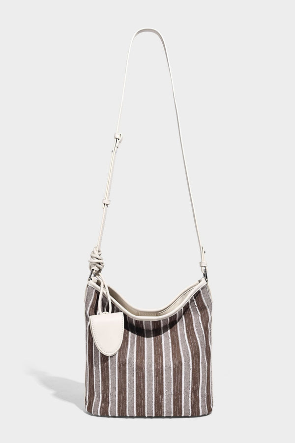 Large striped canvas hobo shoulder bag with cream trim and silver-tone hardware, detail view 20