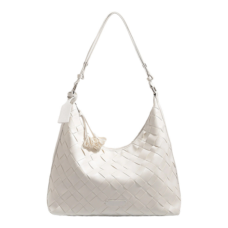 Large woven checker hobo shoulder bag with slim strap, silver-tone hardware, and braided tassel zipper pull, detail view 5