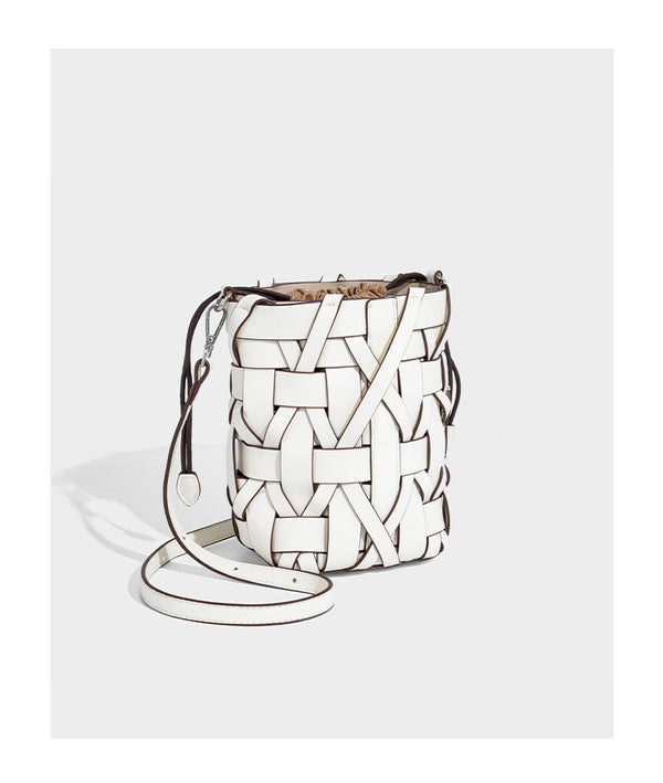 Small woven leather-look bucket bag with interlaced strip exterior, drawstring closure, and adjustable crossbody strap