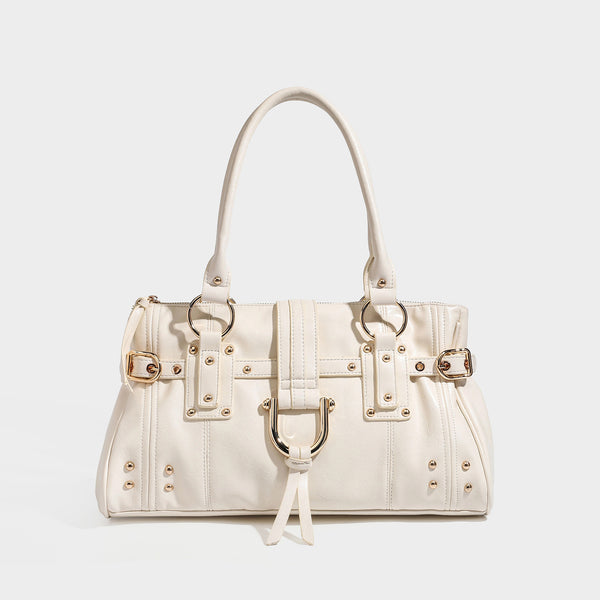 Dark brown glossy leather-look structured satchel tote with gold-tone studs, buckle straps, dual top handles, and detachable