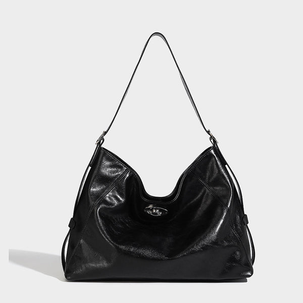 Slouchy hobo shoulder bag with turn-lock flap closure and adjustable strap, detail view 6